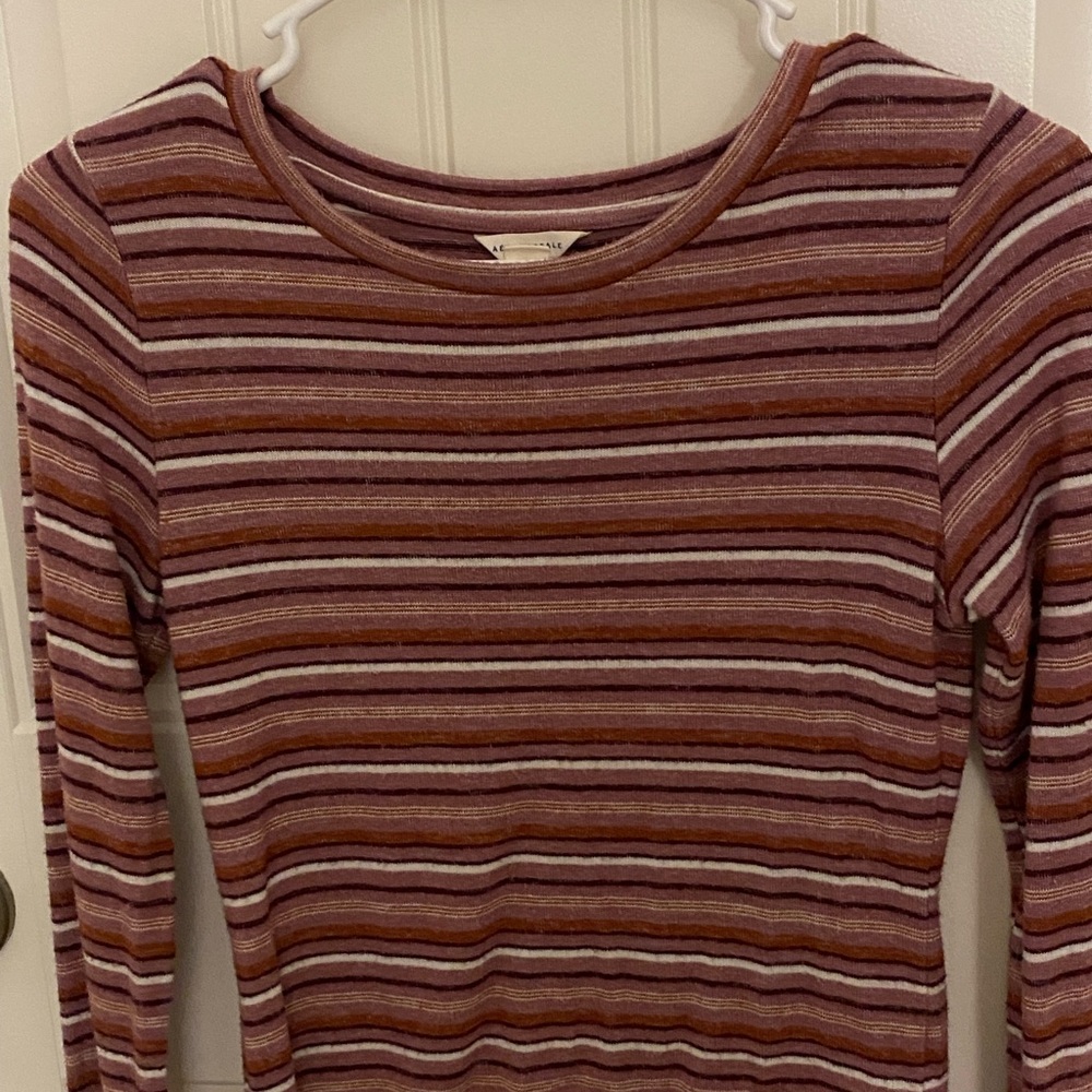 pink stripe and green stripe long sleeve shirts